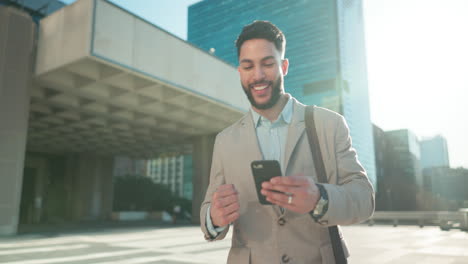 Walking,-phone-or-businessman-winning-in-city