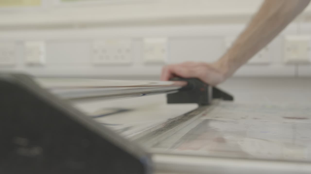 Slicing transparent plastic material to make PPE