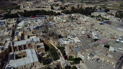 towns of rabat and mdina in malta. aerial tilt up
