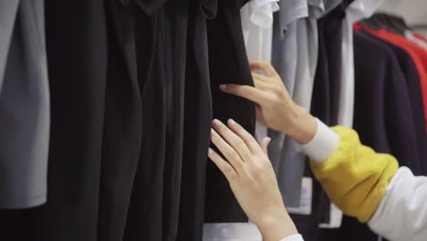 woman shopping for clothes in a store