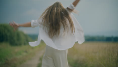 gleeful woman walking scene