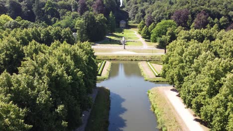 aerial video of nature's park in kleve, germany covering blue water channels, fountains and statues