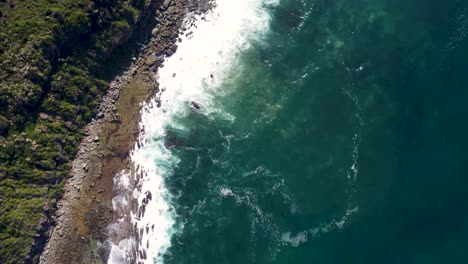 Drone-shot-Pacific-Ocean-Rocky-Reef-crystal-clear-headland-on-coastline-of-Central-Coast-NSW-Australia-3840x2160-4K