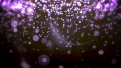 purple bokeh and particles falling happy new year and merry christmas