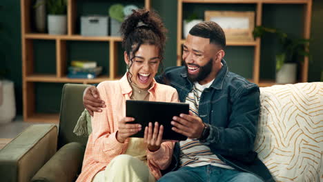 couple enjoying content on a tablet together