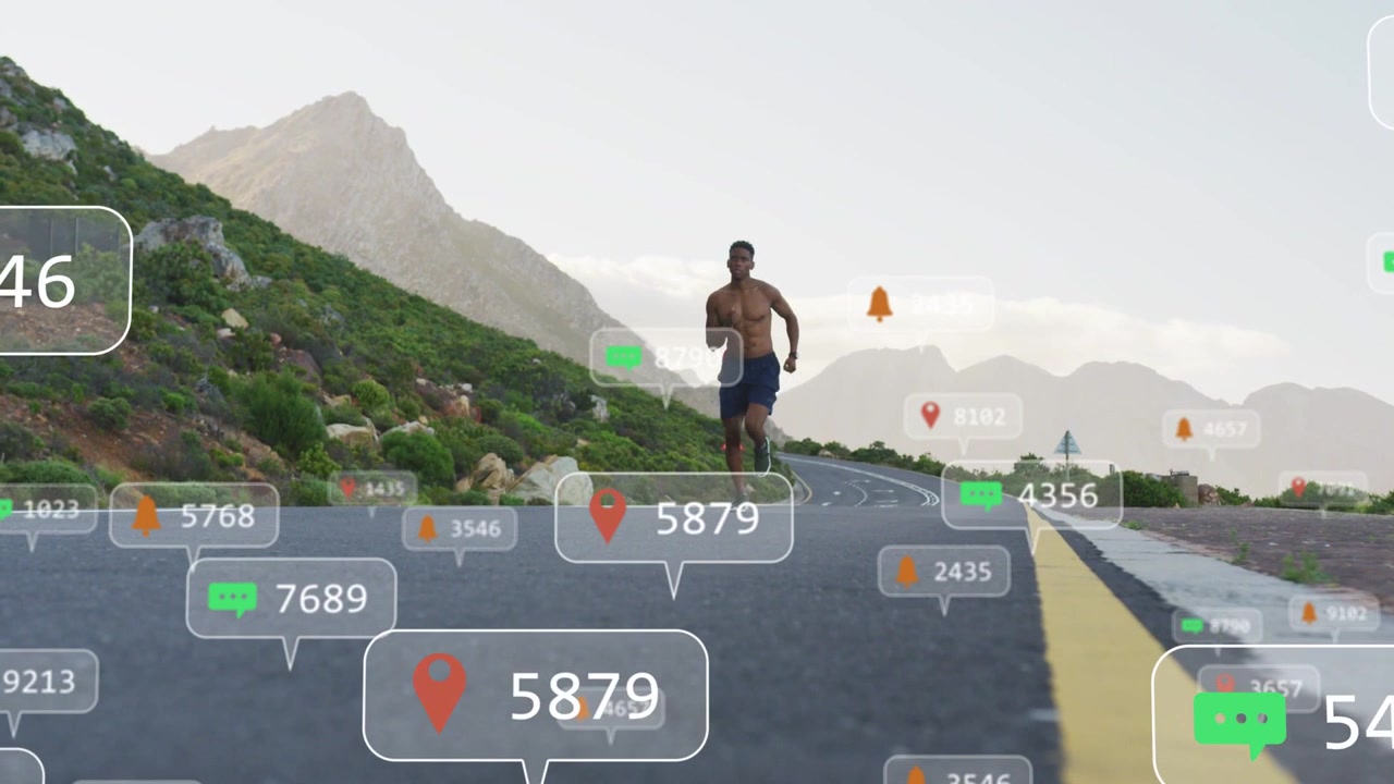Video verticale: Corridore che si avvicina su una strada di montagna, con sovrapposizioni che iniziano ad aggiornare metriche di fitness in tempo reale.