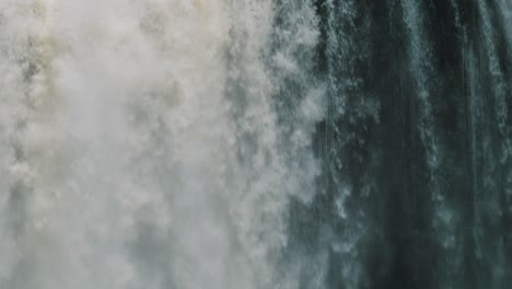 volume of water flowing over the iguazu falls in brazil