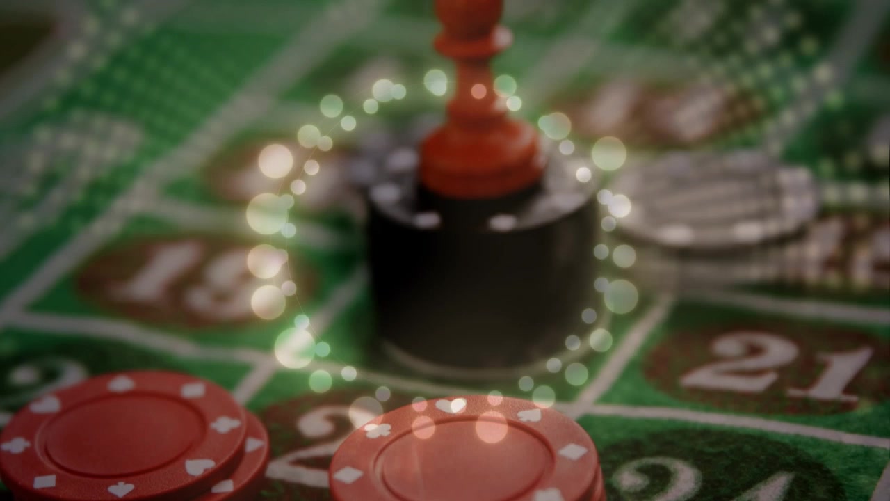 Pedone degli scacchi rosso su tavolo da roulette del casinò con effetto bokeh luminoso