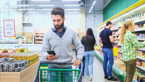 people shopping in a grocery store