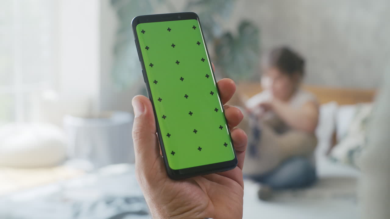 man Sitting on Couch Using Laptop at Home Man Sitting on Couch Using Laptop at Home