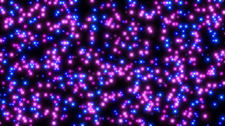 A simple graphic of blue and purple dots set against a black backdrop, creating a visually striking and elegant pattern