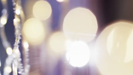 Video-of-flickering-white-bokeh-spots-of-light-with-copy-space