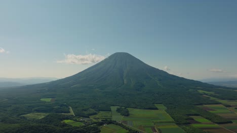 drone aerial fly mount yotei, 'ezo fuji', in hokkaido's shikotsu toya national park of japan, establishing view