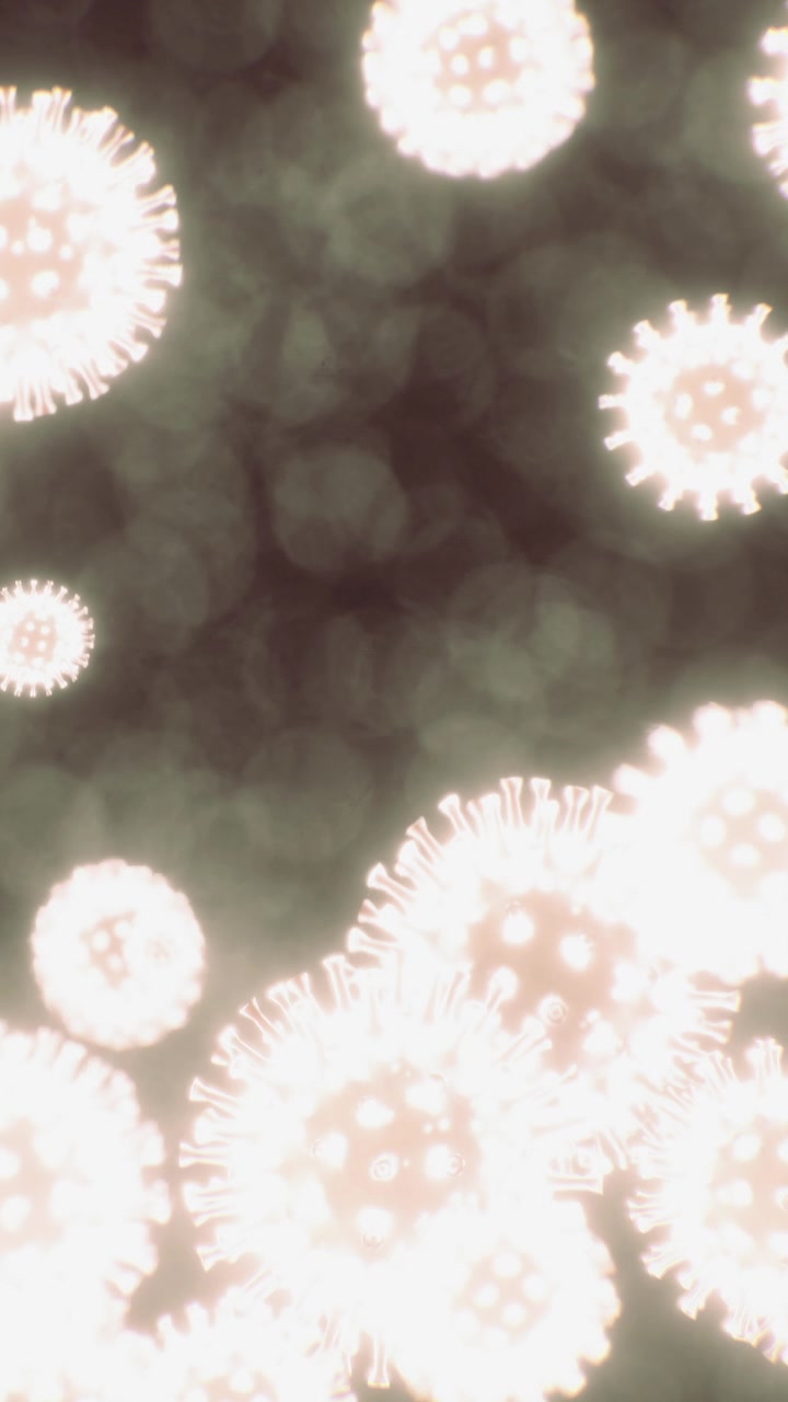 Viruses floating in dark background with glowing edges in abstract view