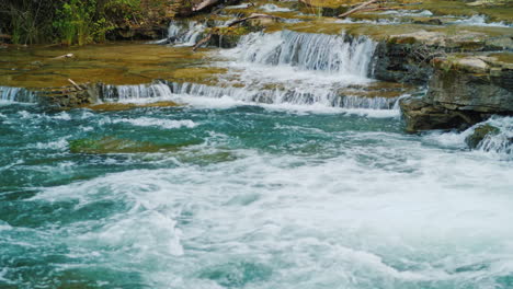 Picturesque-River-Flows-Over-Rocks