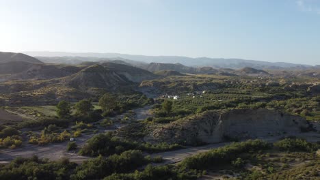 flying towards a dried up river while slowly panning down