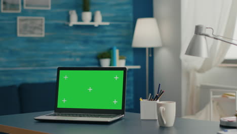 laptop computer with mock up green screen chroma key display