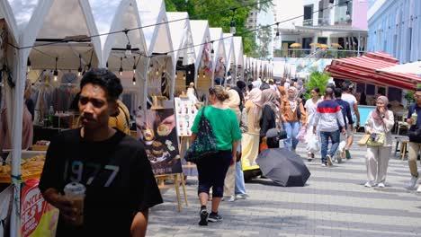 crowded street market in kuala lumpur, malaysia