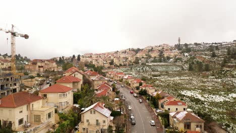 snowy mountain village with construction