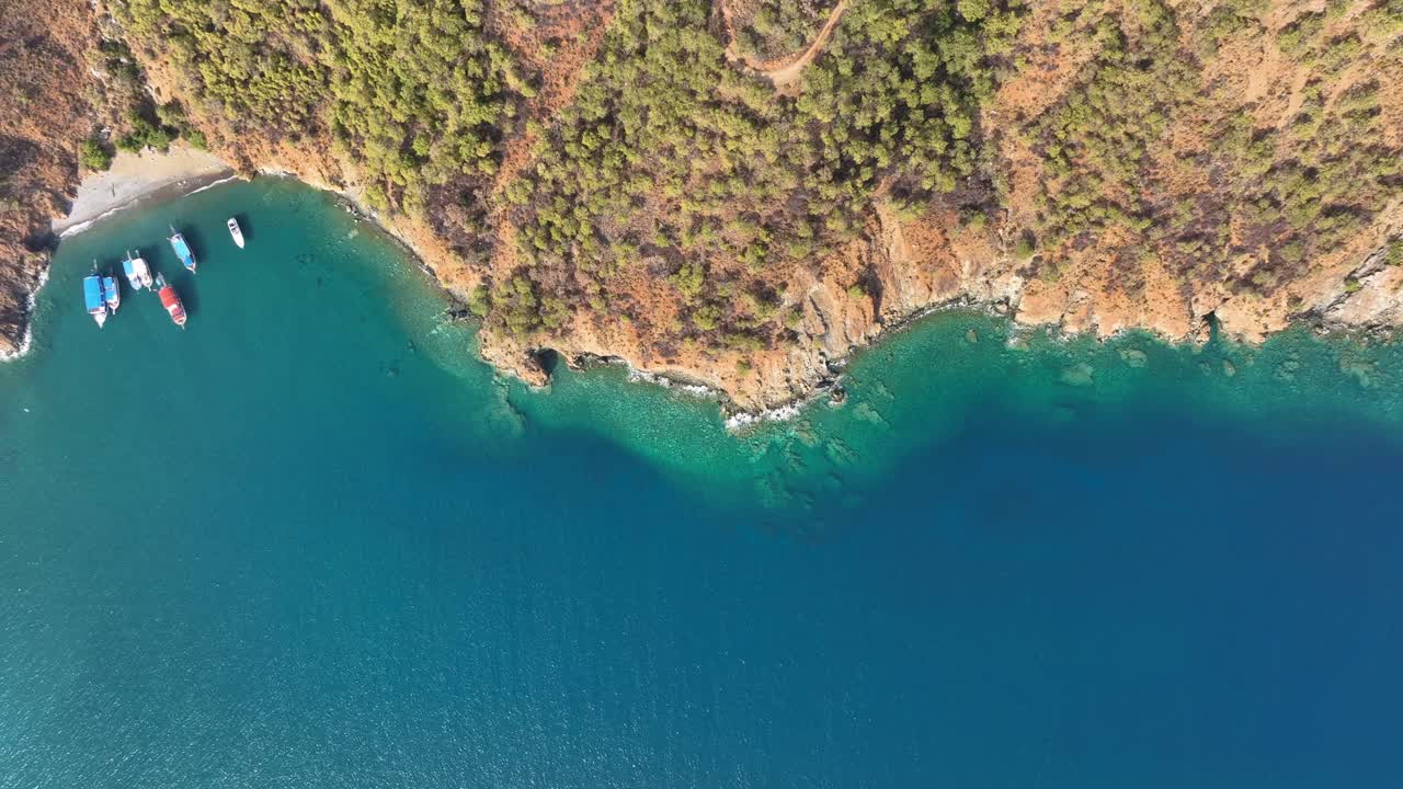 Aerial View of Coastline with Boats