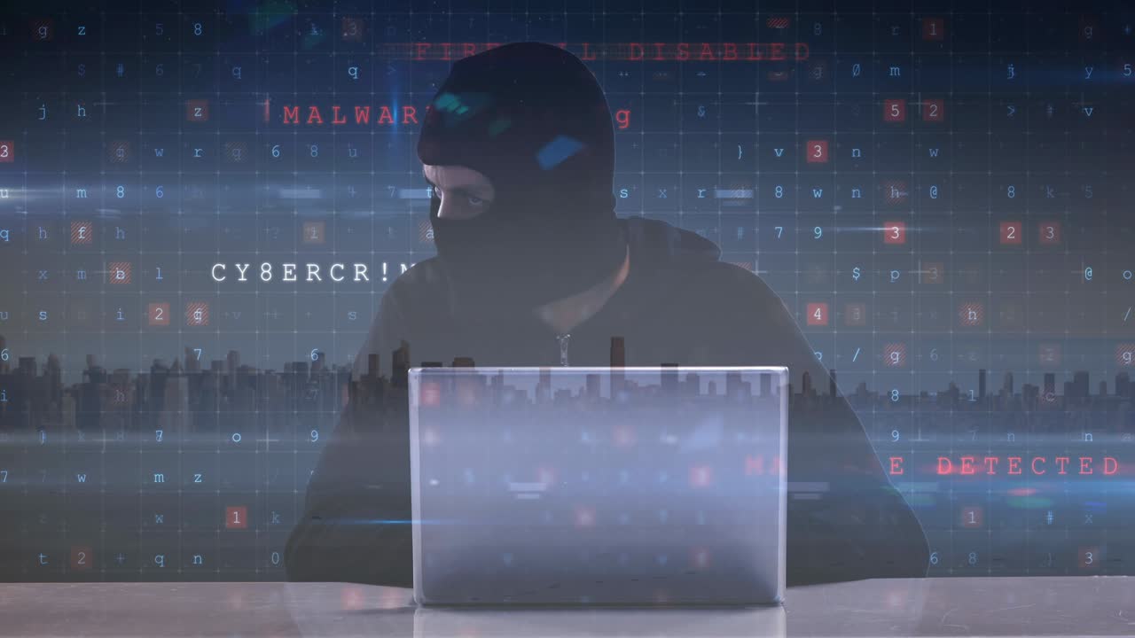 Animation of cyber crime text over hacker in balaclava