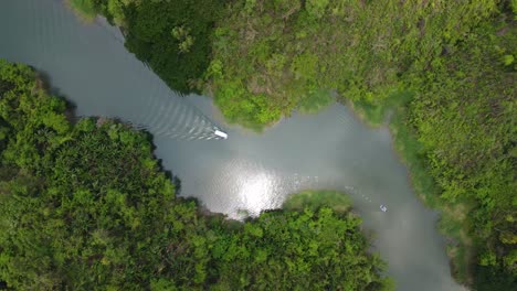 boat on a lake floating drone video top down