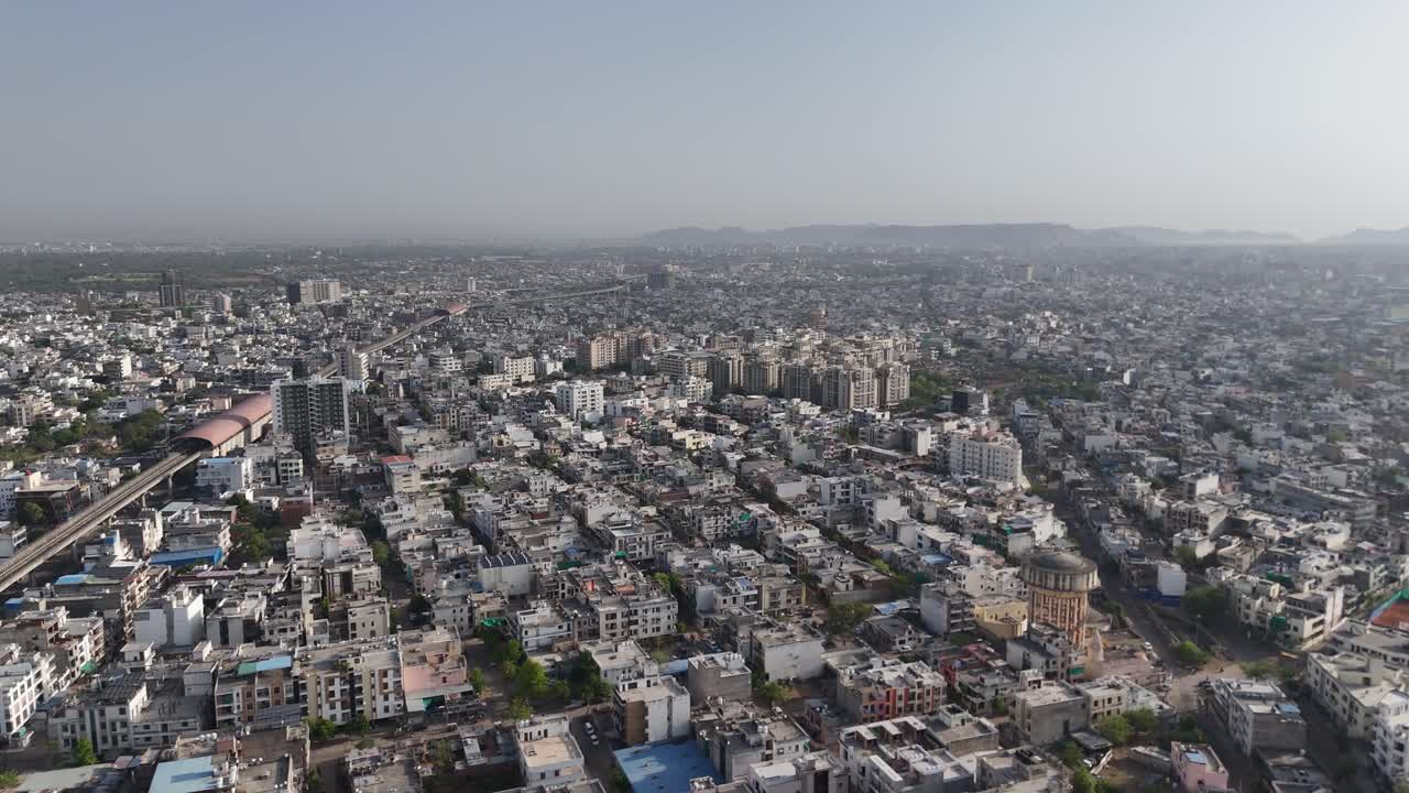 Balanced city planning with alternating greenery and buildings in Jaipur aerial