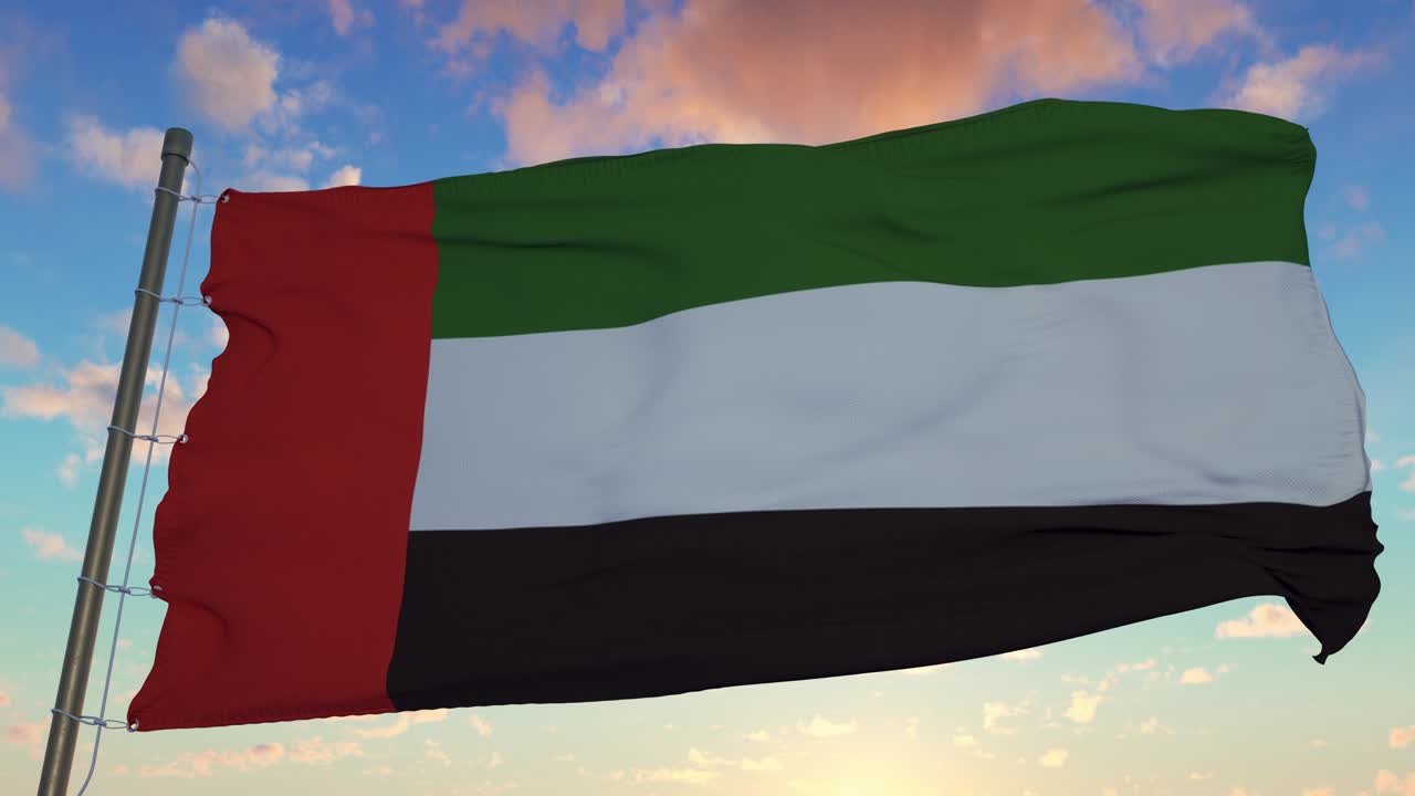 bandera de los emiratos árabes unidos ondeando en el viento contra el cielo profundo hermoso al atardecer