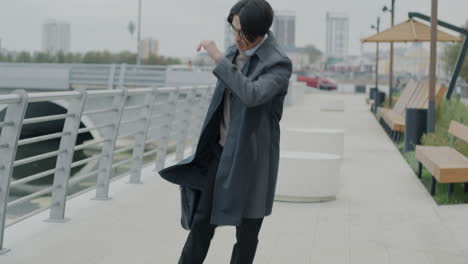 man walking in urban park