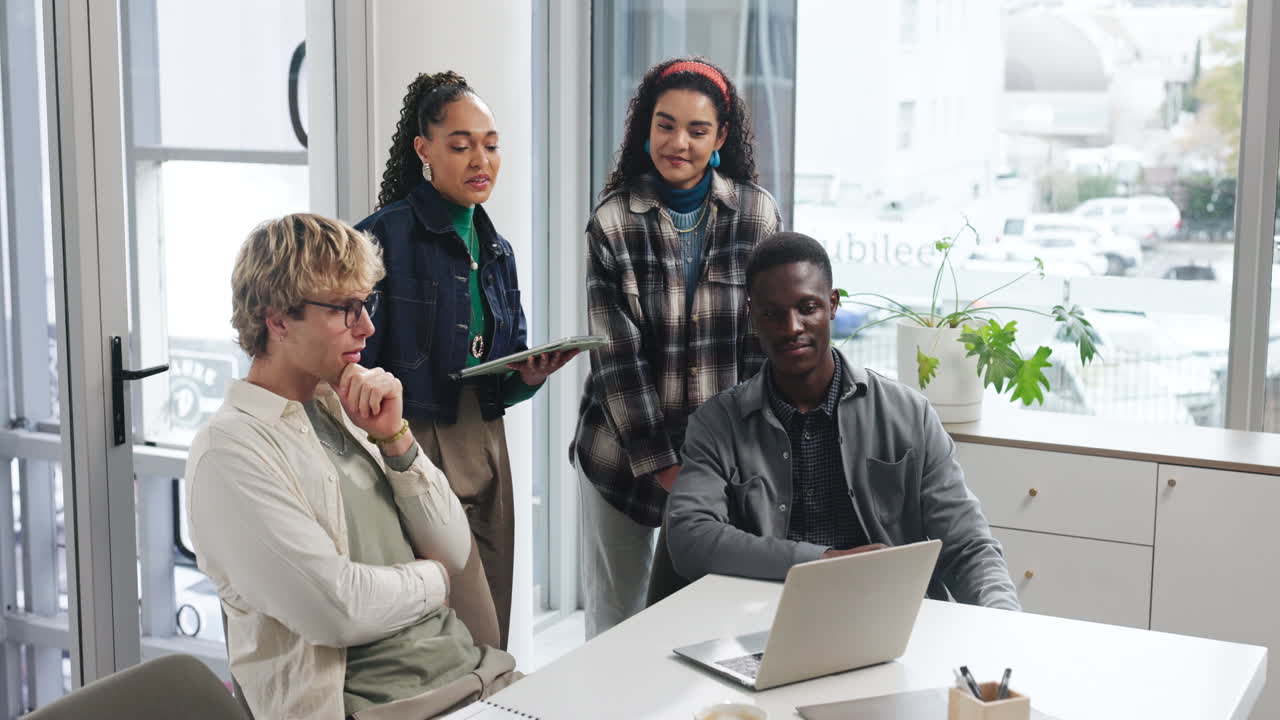 Diverse Team Collaborating on a Project in the Office