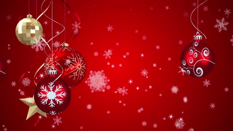 animación de las decoraciones del árbol de navidad sobre la nieve que cae sobre un fondo rojo