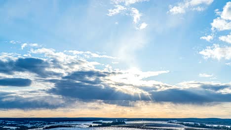 simultaneous movement of clouds of different levels, time intervals, beautiful pre-sunset landscape loop video