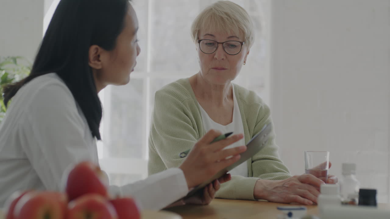 Doctor's Consultation with Elderly Patient