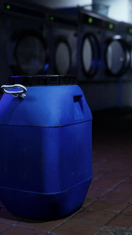 blue barrel in industrial laundry room