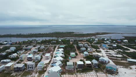 Toma-Aérea-Del-Impresionante-Paseo-Marítimo-De-Cabo-San-Blas,-Zona-Residencial,-Florida