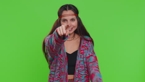 smiling happy woman excitedly pointing to camera choosing lucky happy winner indicating hey you