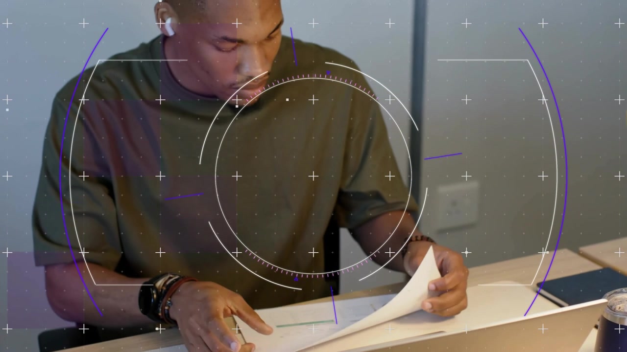 Man writing notes sliding pie chart onto laptop adding earbuds reviewing finance report with HUD