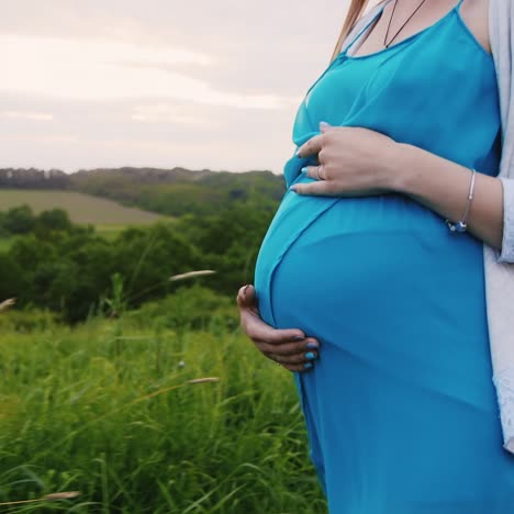 young pregnant woman walking