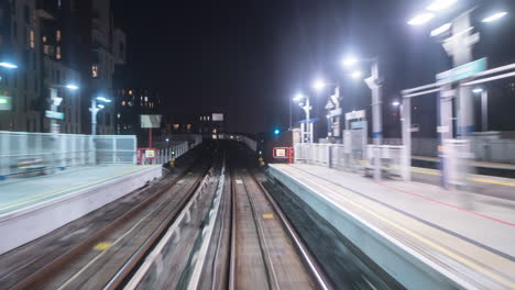 night hyperlapse of london dlr route from lewisham to bank