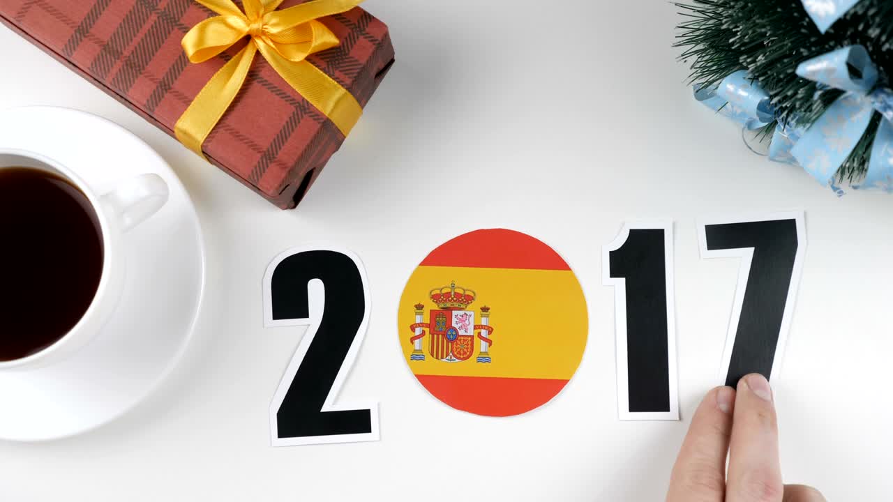 일러스트레이션: 새해, 남성 손, 2017년부터 2018년까지의 해 변경, 스페인 발, 컨트리 볼