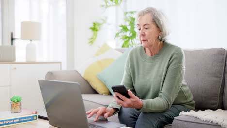 Senior-woman,-laptop-and-phone-on-sofa