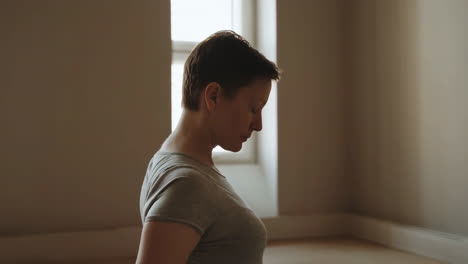woman meditating or in a thoughtful pose