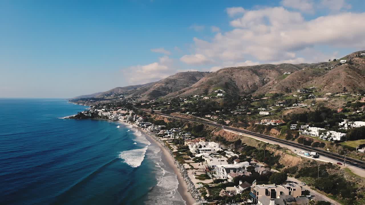 A 4k drone shot of the mountains and the coast of Malibu, California.