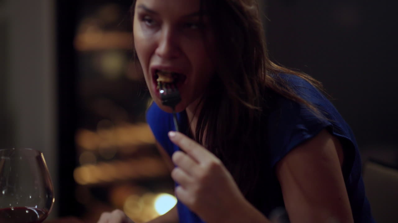 Woman enjoys fine dining