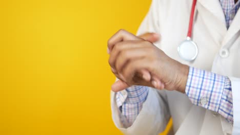 doctor checking pulse and washing hands