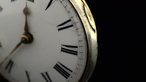 detailed close-up of antique pocket watch mechanism