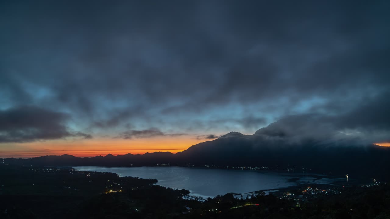 Sunrise over a Volcano and Lake