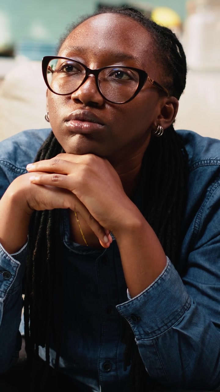 Vertical Video Bored woman with low energy being zoned out and discouraged
