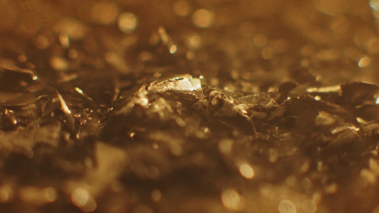 Golden color metallic raspings erratic movement