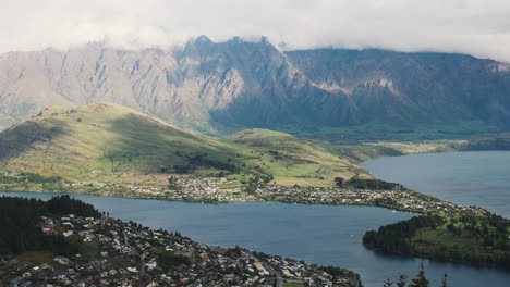 view-of-Queenstown,-New-Zealand,-with-distant-mountains-in-the-background